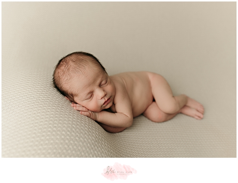 Baby boy sleeping on side in side-laying pose