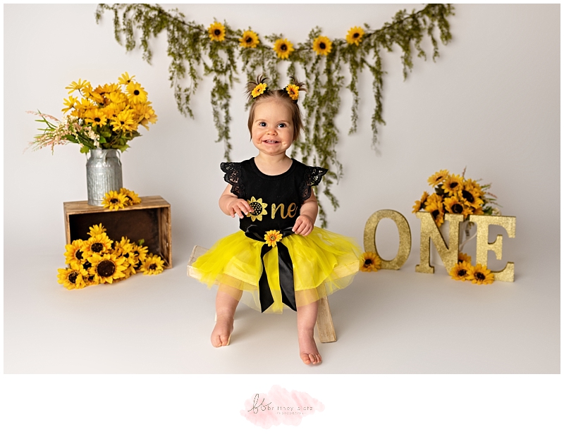 Calgary sunflower cake smash with baby smiling