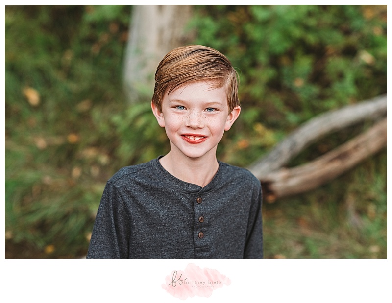 Young boy smiling at camera