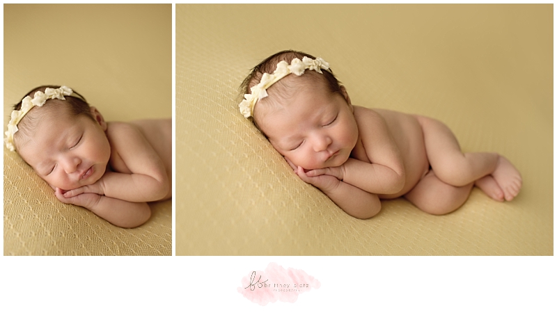 Calgary Newborn Photographer baby girl laying on side