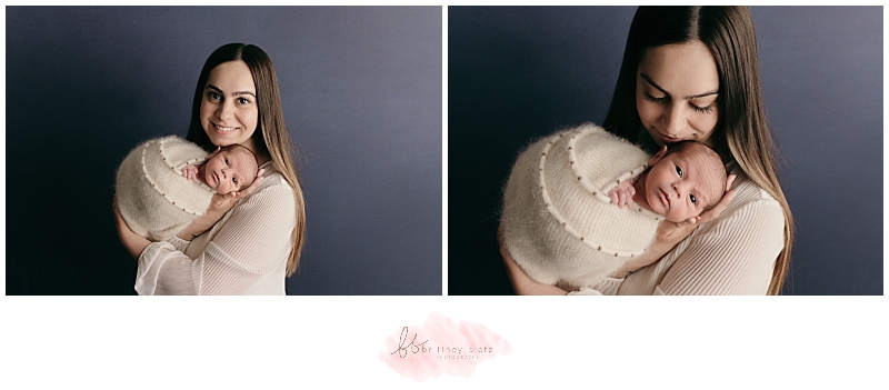 Mom and newborn baby boy posed for studio photography in Calgary