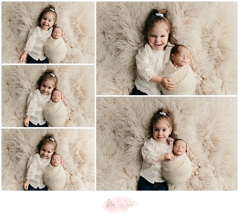 Brother and sister laying on flokati during newborn photo session in Calgary